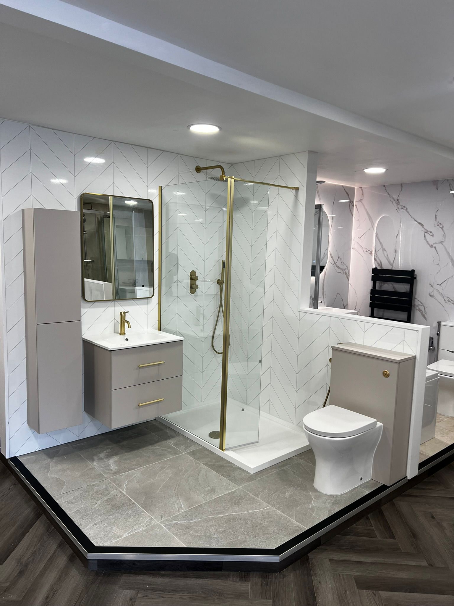 Gold shower enclosure in HSA showroom