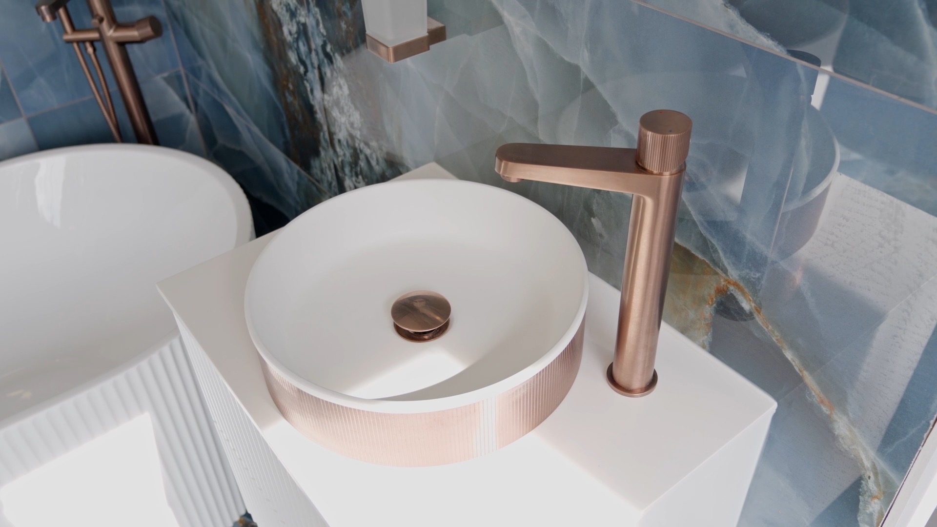 Rose gold basin and tap detail