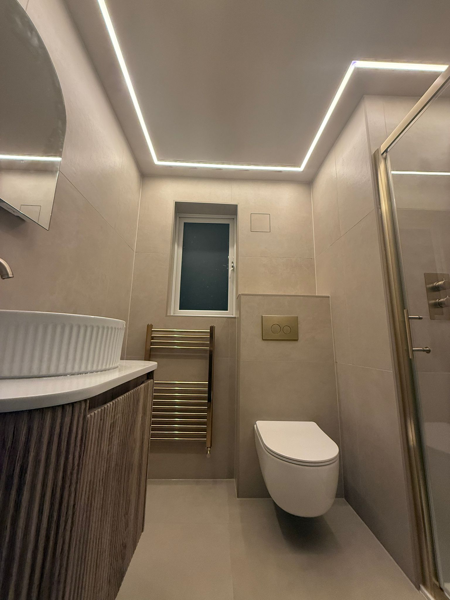 Wall hung toilet with fluted vanity unit